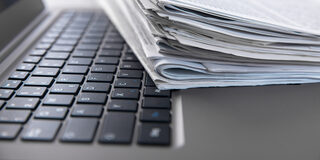 Newspapers,And,Laptop.,Pile,Of,Daily,Papers,With,News,On